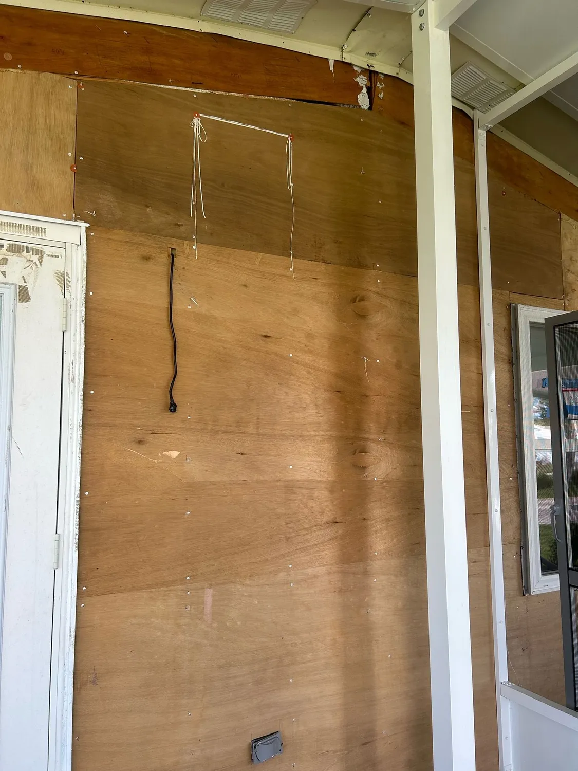Plywood wall sheathing and electrical rough-in during a Hildebrand renovation