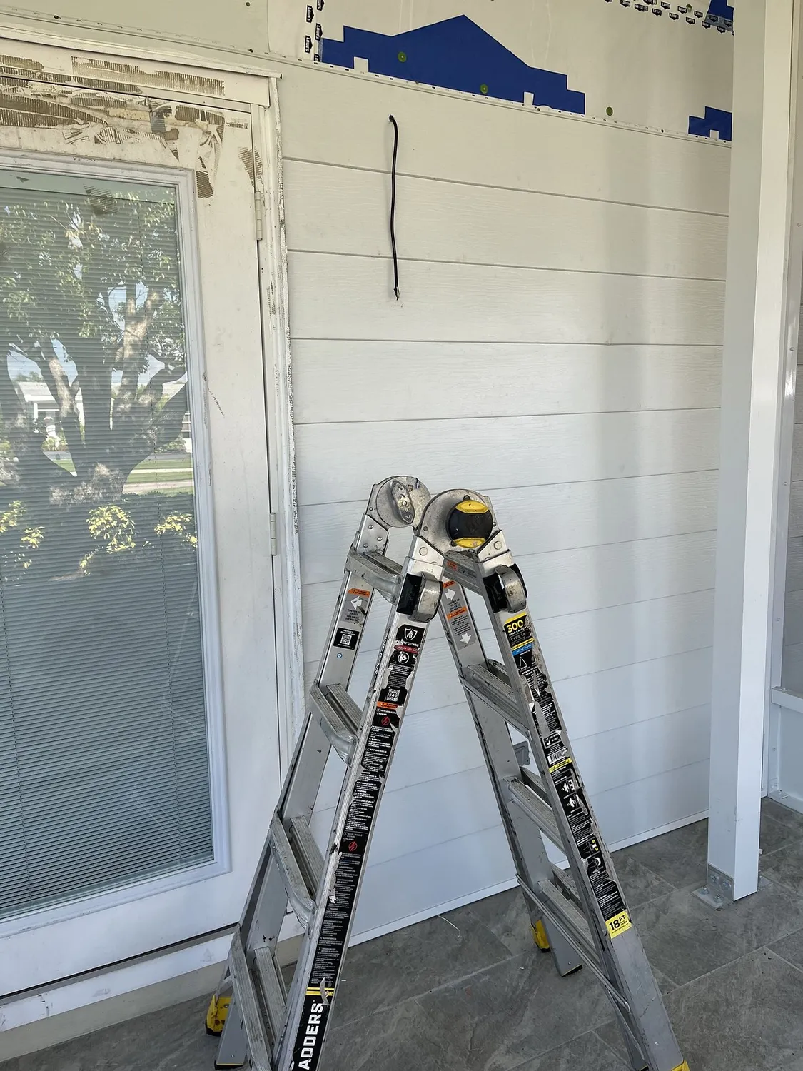 Plank wall and paint prep during a Hildebrand renovation